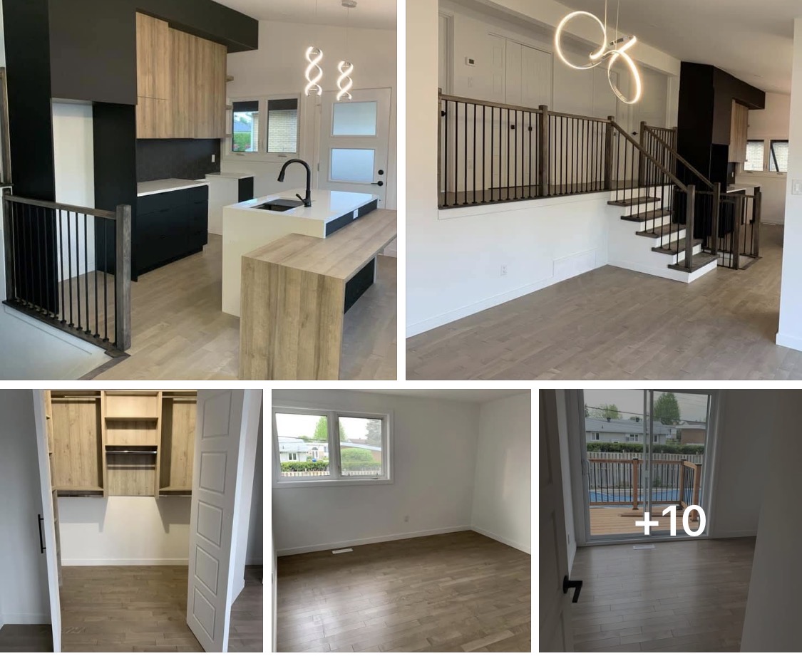 Modern open-concept main floor with black and wood kitchen, waterfall island and custom steel railing staircase