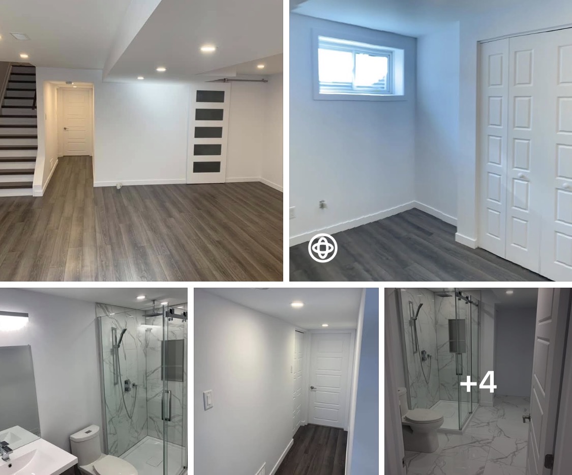 Finished basement with vinyl plank floor, modern doors and full marble bathroom